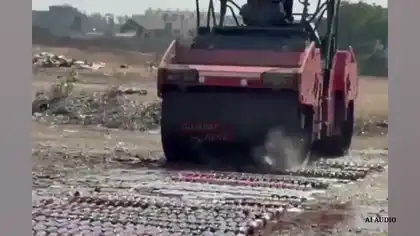 Bulldozer Crushes Liquor Bottles Worth ₹75 Lakh in Jamnagar
